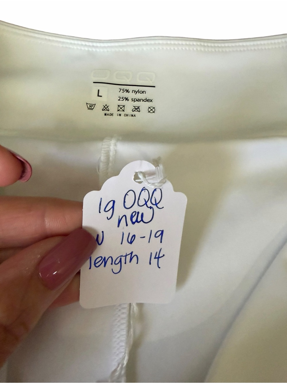 OQQ White Athletic Skort with Crossover Waistband size large - Picture 2 of 4